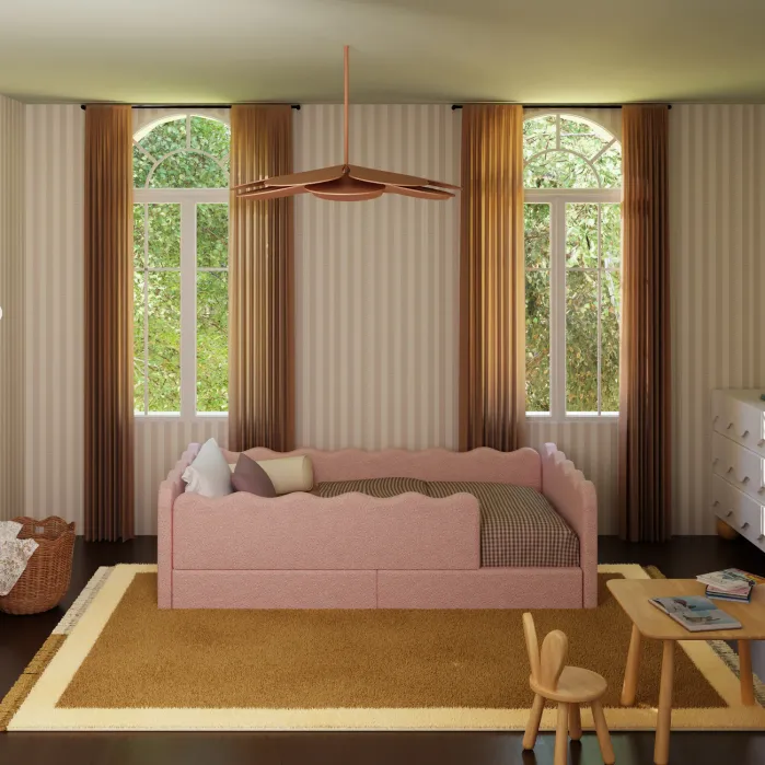 A children's bedroom with a pink bed, brown and beige rug, wooden table and chairs, dresser, woven basket, and large windows with brown curtains.