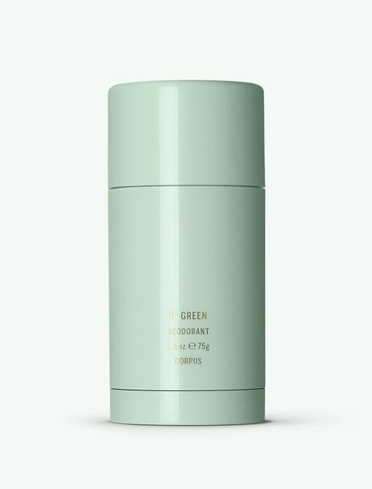 A mint green cylindrical deodorant stick with gold text reading "Corpus No. Green Deodorant 2.6 oz/75g" on a light background.