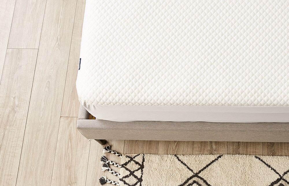 Silk & Snow mattress cover on a bed. 