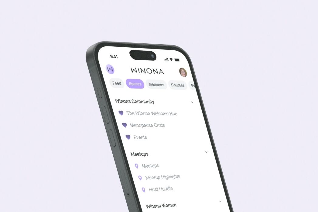 A smartphone screen displays the Winona app, showing tabs for Feed, Spaces, Members, and Courses, and a list of community sections and meetups.
