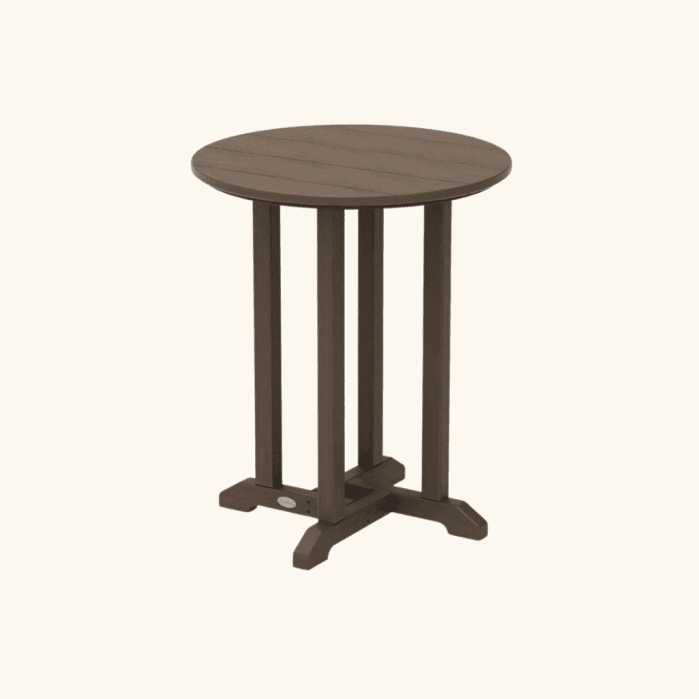 A small, round, brown wooden table with four vertical legs and a sturdy crossbar base, set against a plain light background.